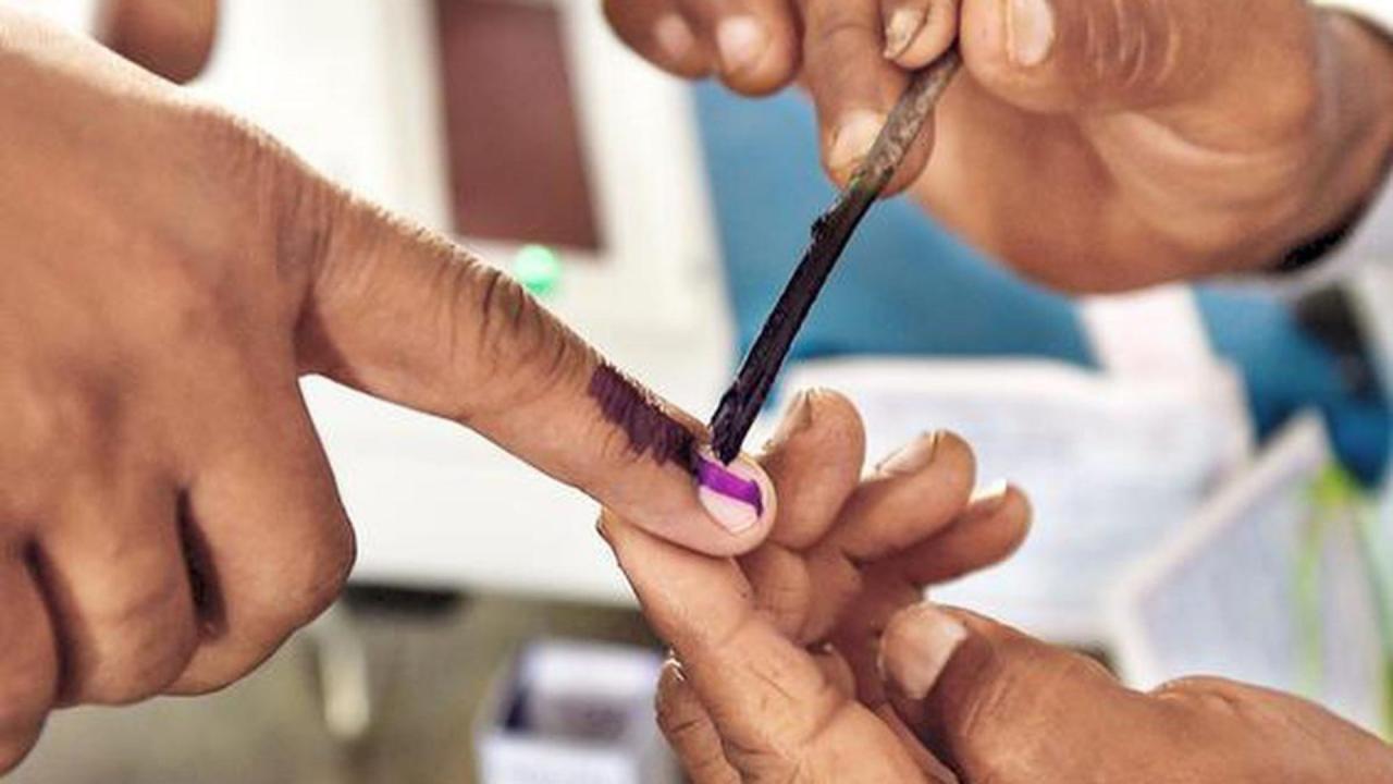 7199025 why election ink on left hand